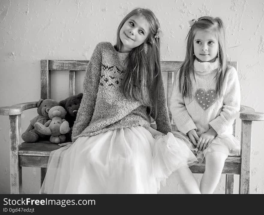 Portrait of Happy Girls Sitting