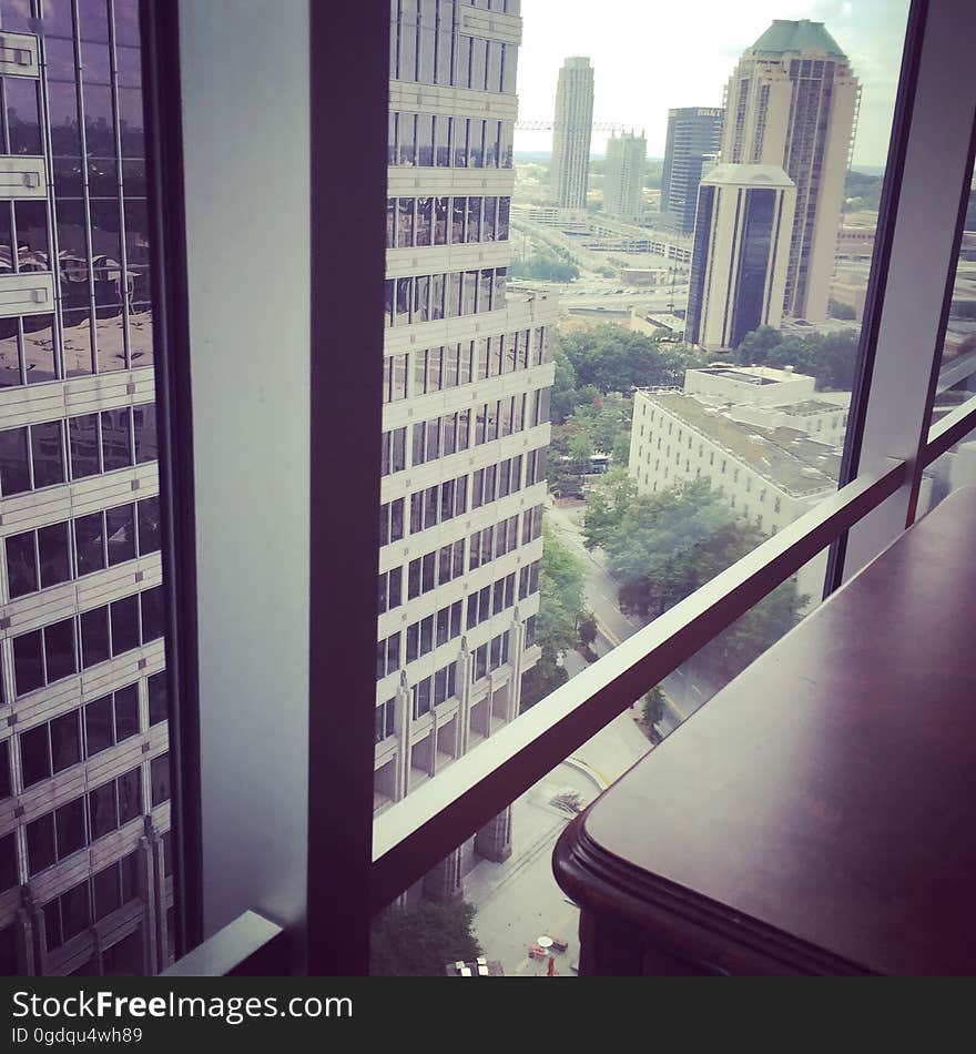 A view of business buildings from an office.