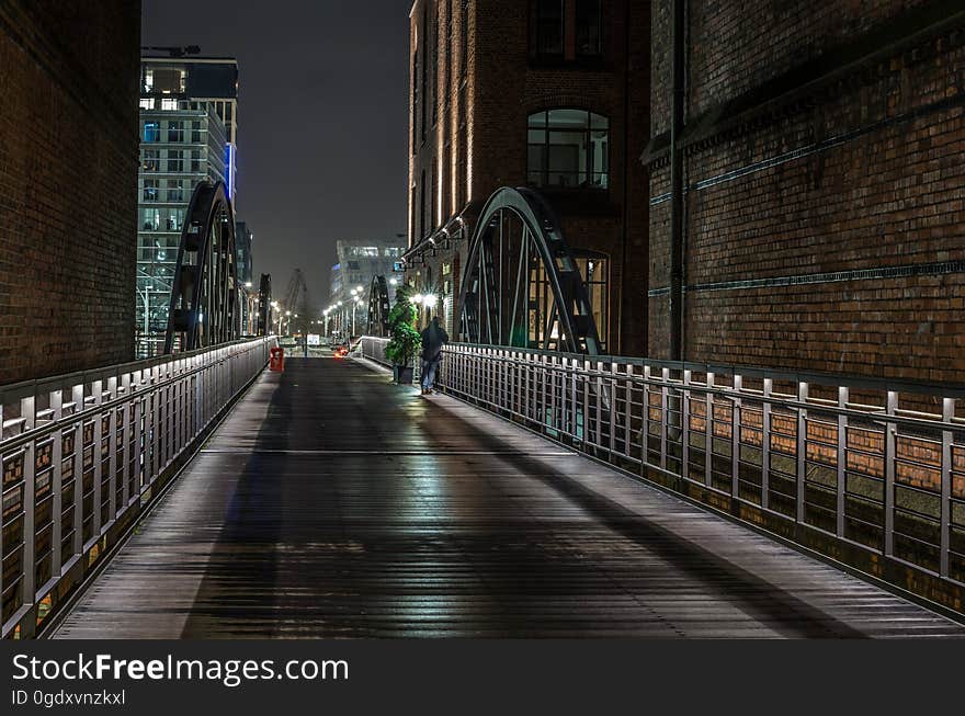 A bridge in a city at night. A bridge in a city at night.