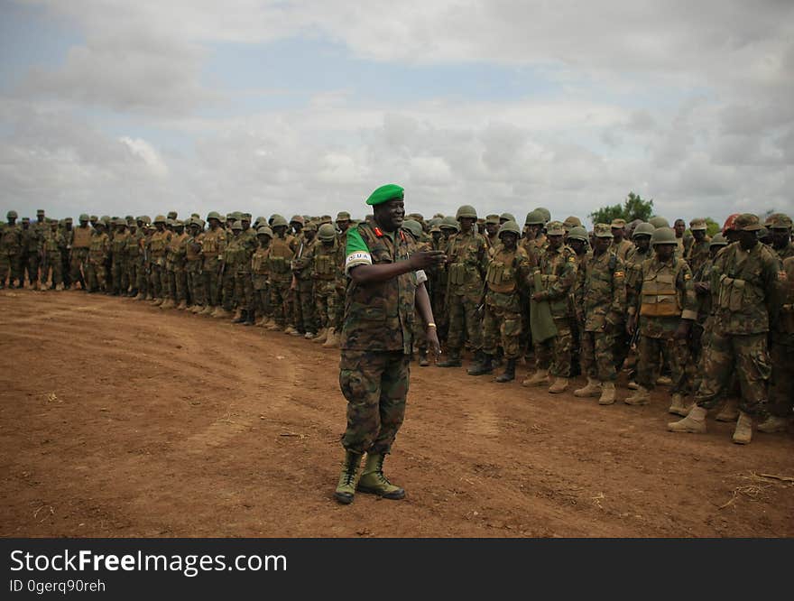 African Union Mission in Somalia &#x28;AMISOM&#x29; Force Commander Lt. Gen. Andrew Gutti addresses Ugandan soldiers serving with the AU operation 5 June in Afgoye located 30km to the west of the Somali capital Mogadishu. AMISOM supporting Somali National Army &#x28;SNA&#x29; forces recently liberated the Afgoye Corridor from the Al Qaeda-affiliated extremist group Al Shabaab, pushing them further away from Mogadishu and opening up the free flow of goods and produce between the fertile agricultural area surrounding Afgoye and the Somali capital. AU-UN IST PHOTO / STUART PRICE. African Union Mission in Somalia &#x28;AMISOM&#x29; Force Commander Lt. Gen. Andrew Gutti addresses Ugandan soldiers serving with the AU operation 5 June in Afgoye located 30km to the west of the Somali capital Mogadishu. AMISOM supporting Somali National Army &#x28;SNA&#x29; forces recently liberated the Afgoye Corridor from the Al Qaeda-affiliated extremist group Al Shabaab, pushing them further away from Mogadishu and opening up the free flow of goods and produce between the fertile agricultural area surrounding Afgoye and the Somali capital. AU-UN IST PHOTO / STUART PRICE.