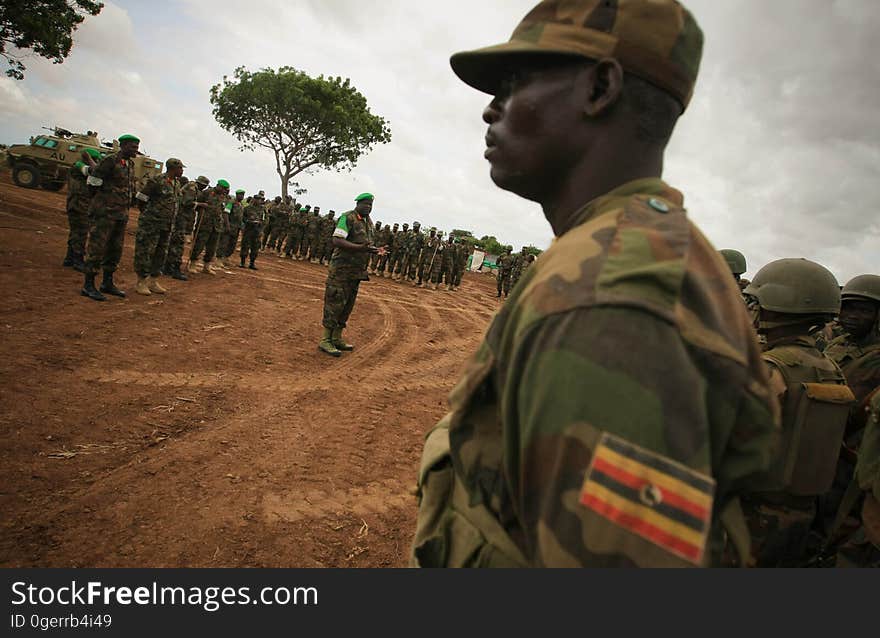 African Union Mission in Somalia &#x28;AMISOM&#x29; Force Commander Lt. Gen. Andrew Gutti addresses Ugandan soldiers serving with the AU operation 5 June in Afgoye located 30km to the west of the Somali capital Mogadishu. AMISOM supporting Somali National Army &#x28;SNA&#x29; forces recently liberated the Afgoye Corridor from the Al Qaeda-affiliated extremist group Al Shabaab, pushing them further away from Mogadishu and opening up the free flow of goods and produce between the fertile agricultural area surrounding Afgoye and the Somali capital. AU-UN IST PHOTO / STUART PRICE. African Union Mission in Somalia &#x28;AMISOM&#x29; Force Commander Lt. Gen. Andrew Gutti addresses Ugandan soldiers serving with the AU operation 5 June in Afgoye located 30km to the west of the Somali capital Mogadishu. AMISOM supporting Somali National Army &#x28;SNA&#x29; forces recently liberated the Afgoye Corridor from the Al Qaeda-affiliated extremist group Al Shabaab, pushing them further away from Mogadishu and opening up the free flow of goods and produce between the fertile agricultural area surrounding Afgoye and the Somali capital. AU-UN IST PHOTO / STUART PRICE.