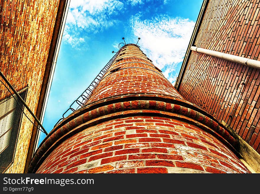 Low Angle View of Brown Bricks Tower