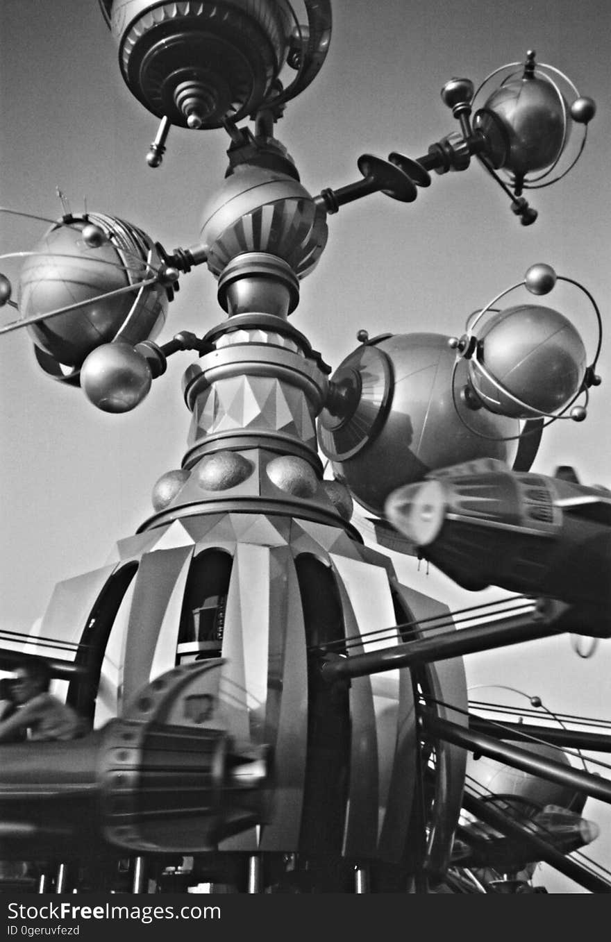 A carousel with planets and stars design in black and white. A carousel with planets and stars design in black and white.