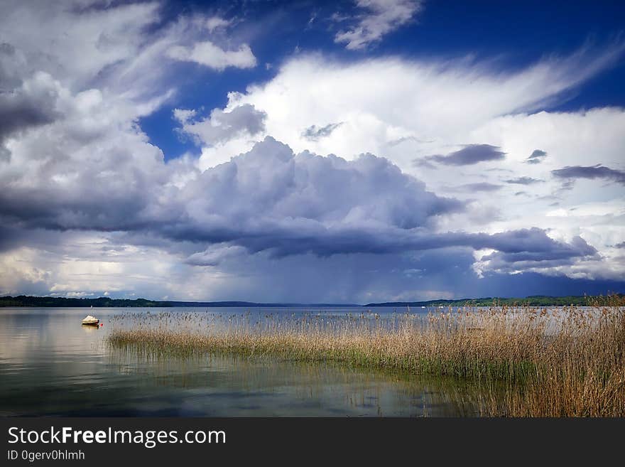 A calm lake before a storm hits.