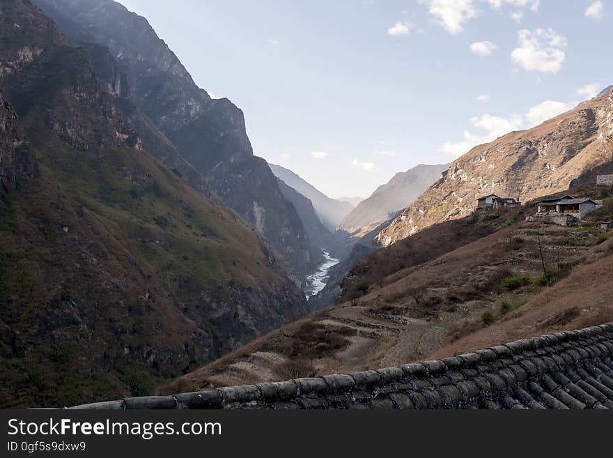 Sky, Mountain, Cloud, Highland, Slope, Mountainous landforms