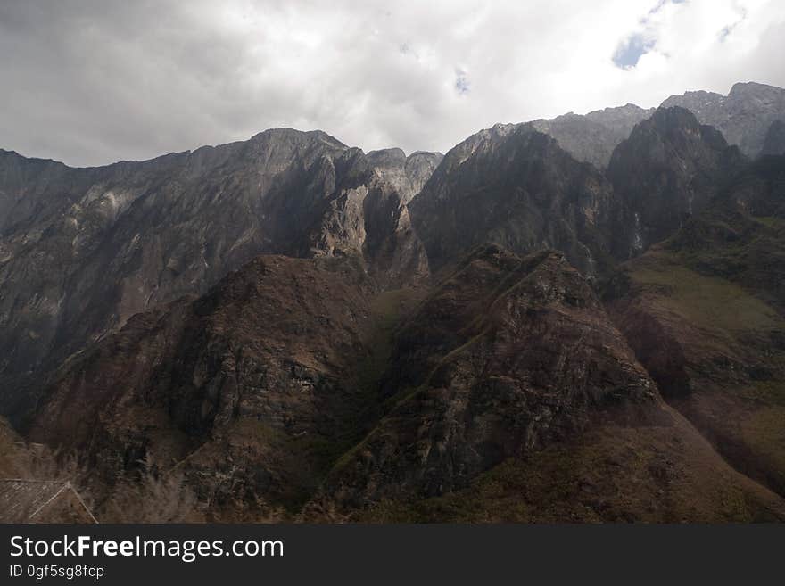 Cloud, Sky, Mountain, Bedrock, Atmospheric phenomenon, Terrain