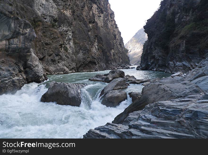 Water, Mountain, Natural landscape, Fluvial landforms of streams, Bedrock, Sky