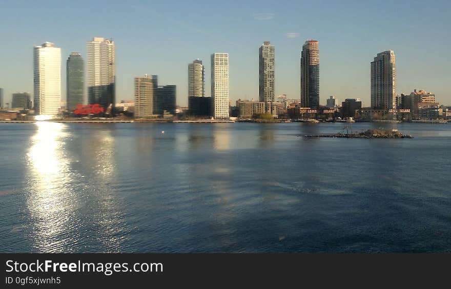 Water, Skyscraper, Sky, Building, Tower block, Tower