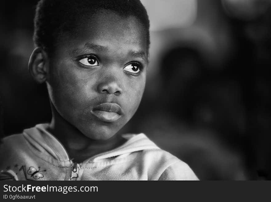 A portrait of a young black boy.