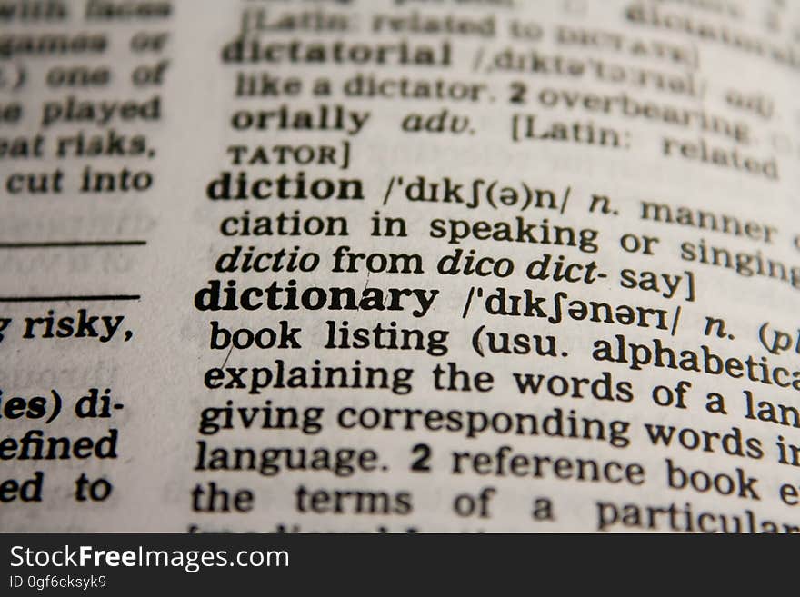 Closeup of the definition of a dictionary. Closeup of the definition of a dictionary.