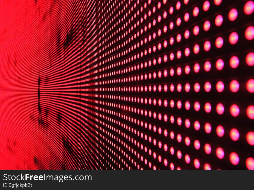 Red Lights in Line on Black Surface