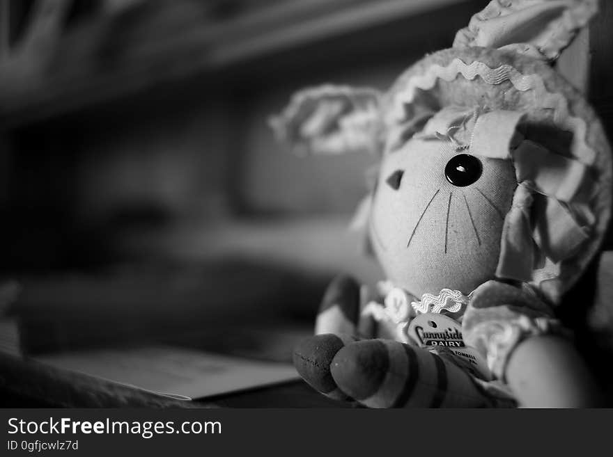 Grayscale Photography of Cartoon Character Plush Toy