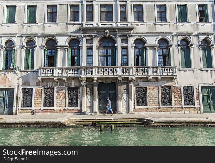 A historic house and the canals in Venice, Italy. A historic house and the canals in Venice, Italy.