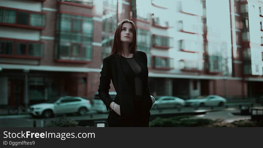 Woman Standing Looking Up