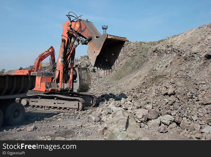 Bulldozer grab stones with bucket