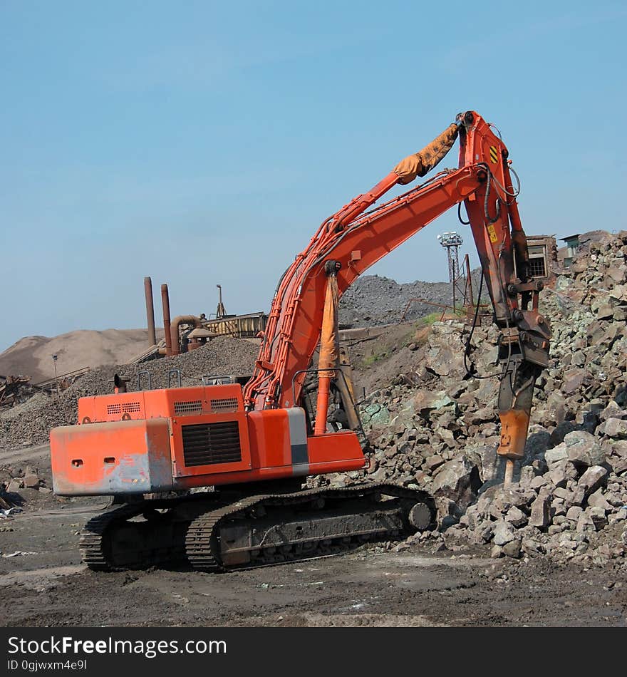 Bulldozer grab stones with bucket