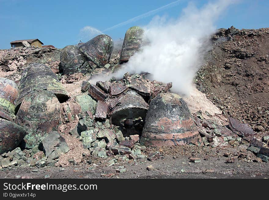 Stones of byproduct plant waste in industrial quarry