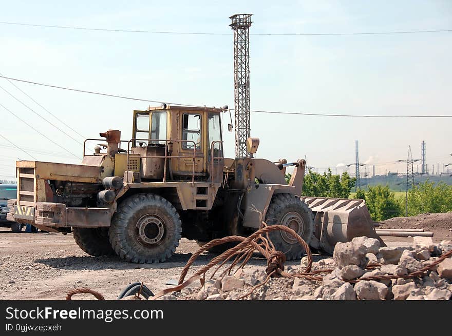 Bulldozer in industrial quarry