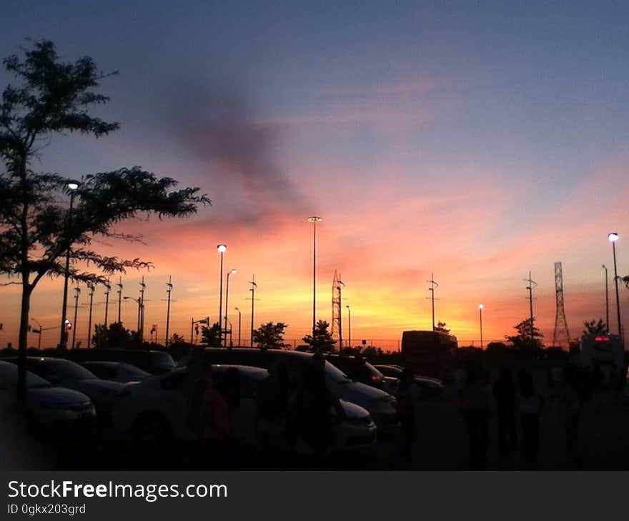 A photo of a sunset I took while on a trip in Toronto. Actually, I think it was in the Playdium parking lot. A photo of a sunset I took while on a trip in Toronto. Actually, I think it was in the Playdium parking lot.