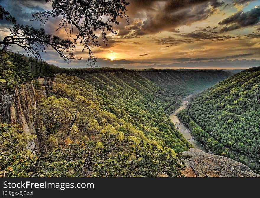 Green Mountain Near River during Daytime Painting