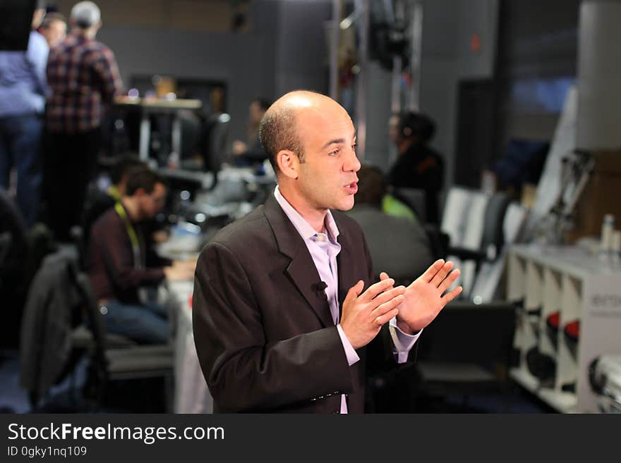 A businessman holding a presentation or explaining something.