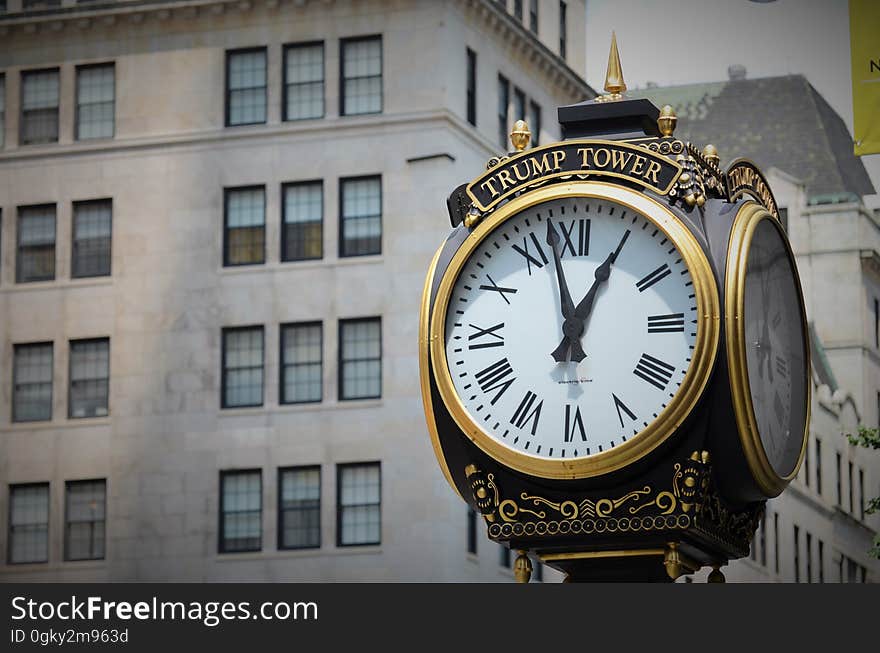 The clock in front of the Trump Tower Trump Tower on the Fifth Avenue in Midtown Manhattan, New York City. The clock in front of the Trump Tower Trump Tower on the Fifth Avenue in Midtown Manhattan, New York City.