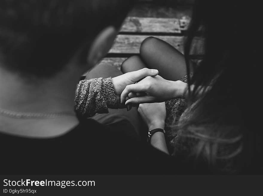 Close-up of Couple Holding Hands