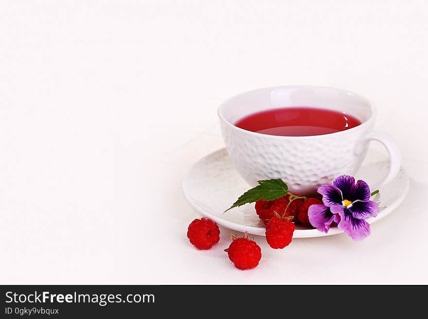 White Ceramic Cup on White Saucer