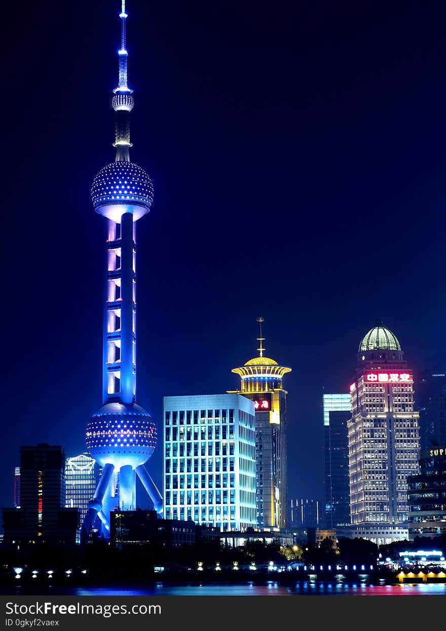 Illuminated City Skyline at Night