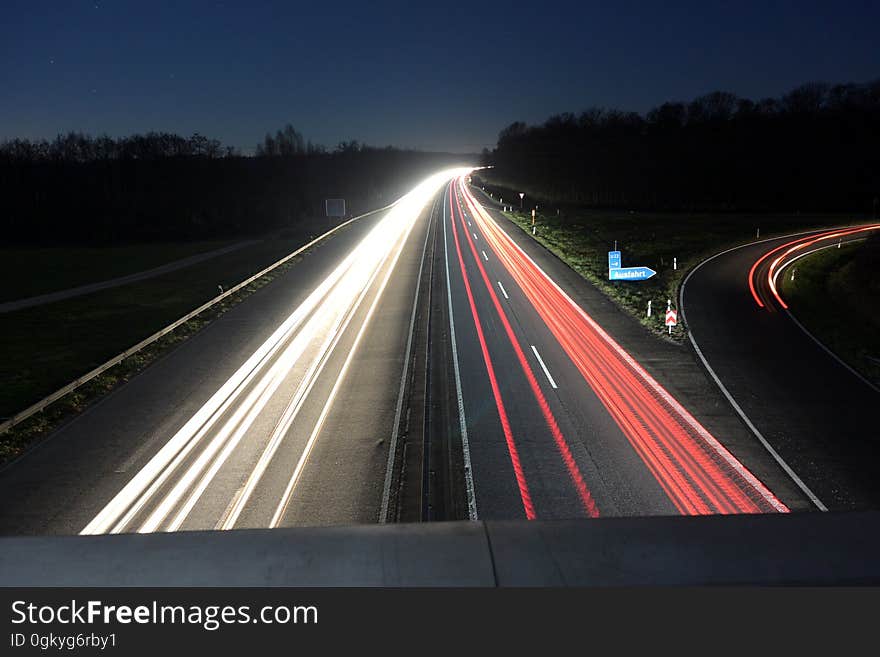 A long exposure of car lights on a highway. A long exposure of car lights on a highway.