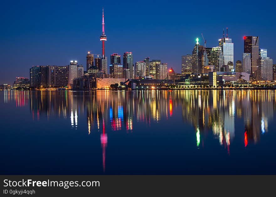 A night view of the Toronto city skyline with CN Tower. A night view of the Toronto city skyline with CN Tower.