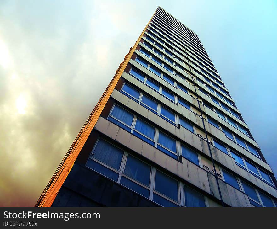 An angled view of a high rise building.