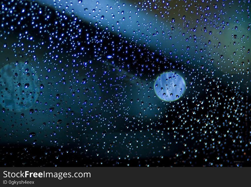 Closeup of raindrops on a window. Closeup of raindrops on a window.