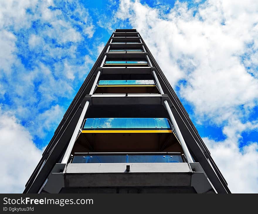 Balconies on a skyscraper from a low angle. Balconies on a skyscraper from a low angle.