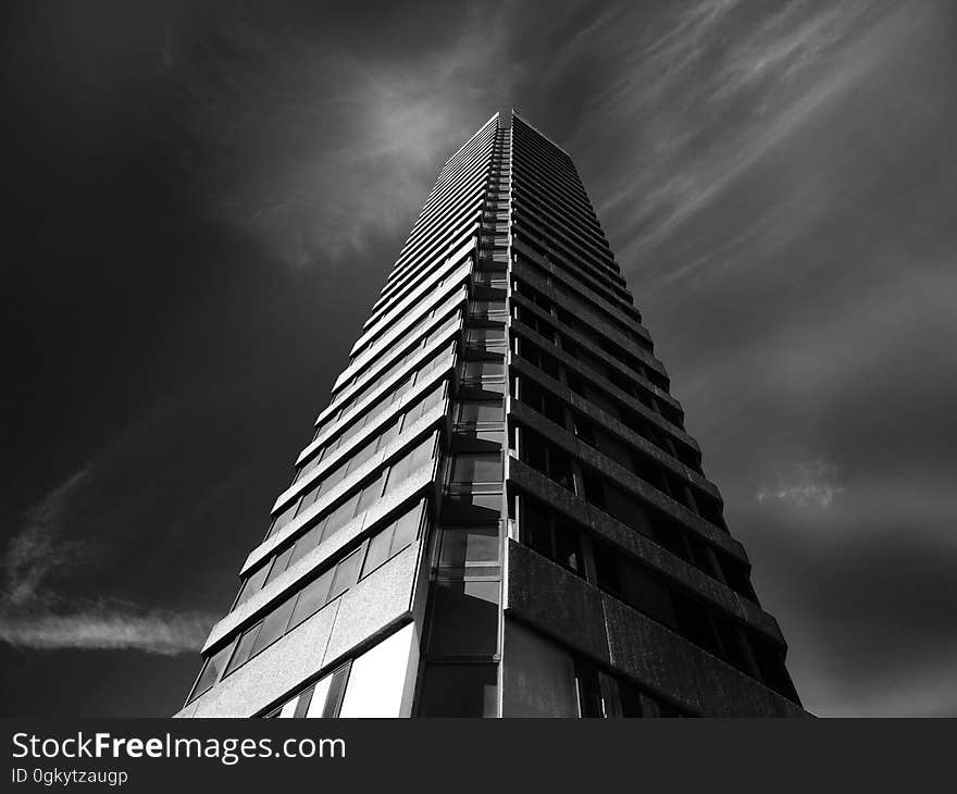 An angled view of a modern sky scraper.