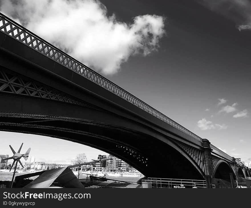 An angled shot of the underside of a bridge.