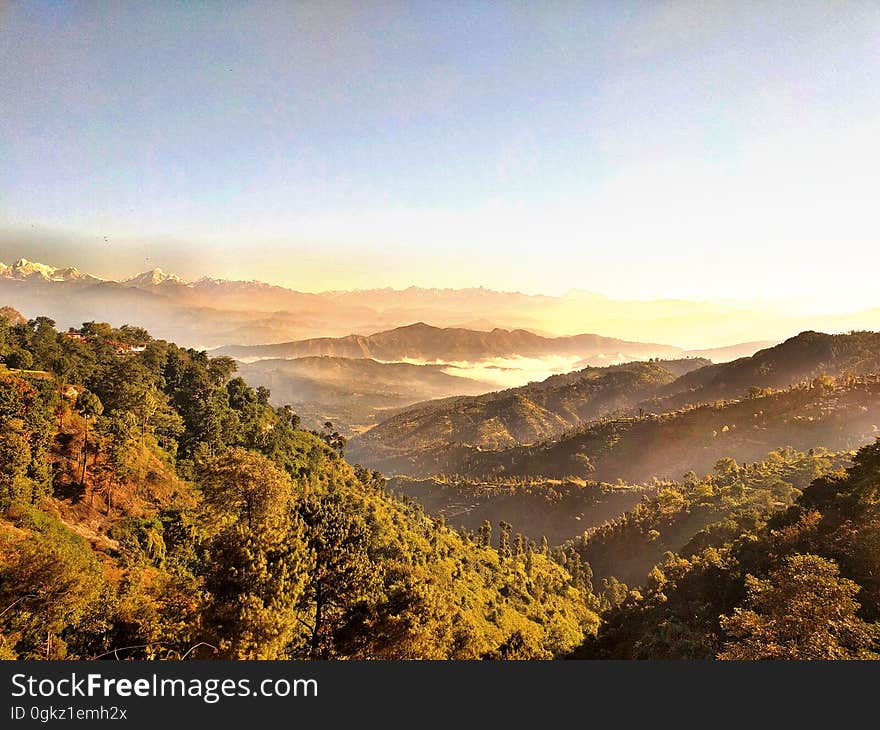 Scenic view of misty, morning mountains. Scenic view of misty, morning mountains.