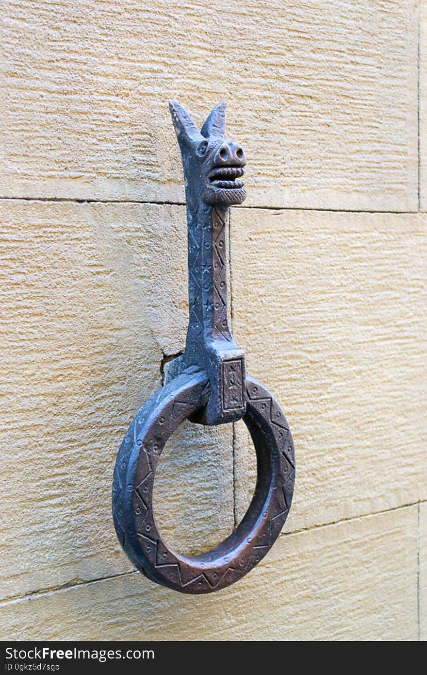 Wrought-iron works for tethering horses are found throughout Florence, set about one meter and a half above ground and resembling dragon, lion heads or other an. Wrought-iron works for tethering horses are found throughout Florence, set about one meter and a half above ground and resembling dragon, lion heads or other an