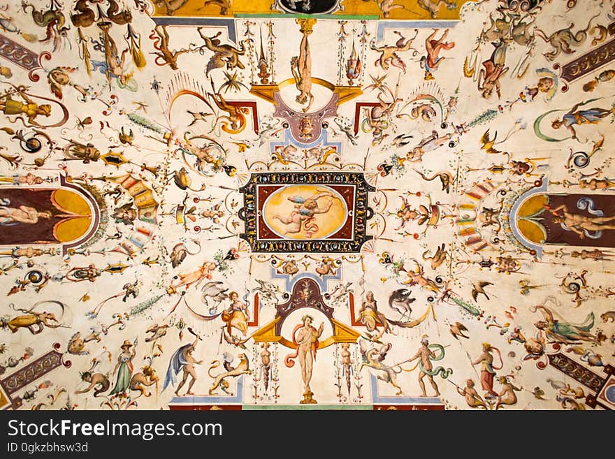 Alegorical and mythological creatures and symbols are painted on the ceiling of Uffizi Gallery corridors. Alegorical and mythological creatures and symbols are painted on the ceiling of Uffizi Gallery corridors.