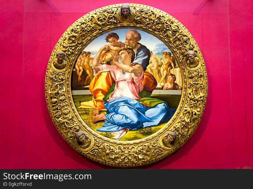 This is the only complete painting by Michelangelo that survived and depicts the Holy Family in a round shaped frame with carved protruding heads of Doni and St. This is the only complete painting by Michelangelo that survived and depicts the Holy Family in a round shaped frame with carved protruding heads of Doni and St