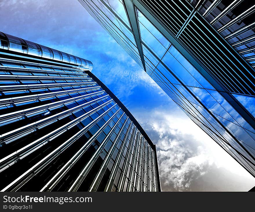 High rise contemporary buildings against blue skies on sunny day. High rise contemporary buildings against blue skies on sunny day.