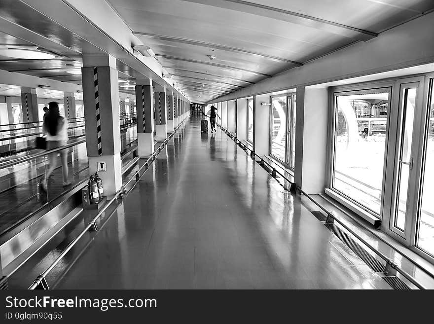 Woman Running on Hallway