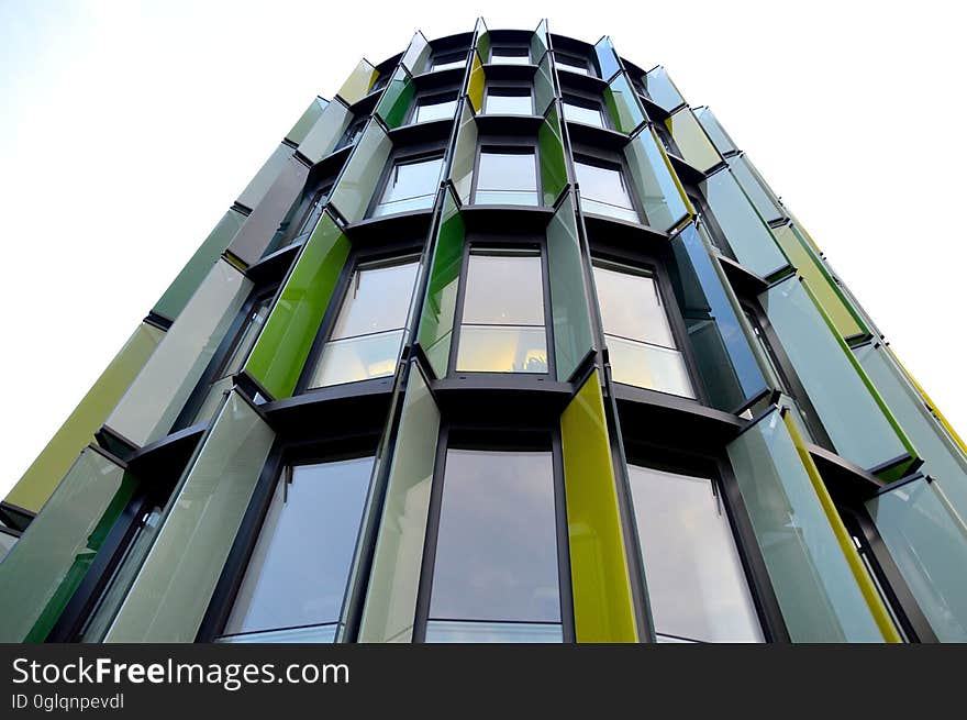 Colorful panels on exterior of contemporary building against overcast skies on sunny day. Colorful panels on exterior of contemporary building against overcast skies on sunny day.