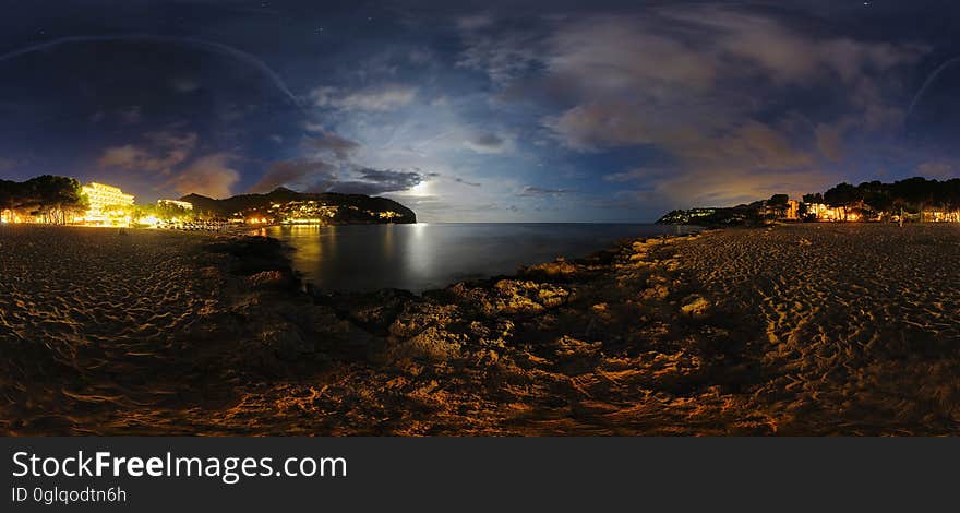 An empty beach at dusk.