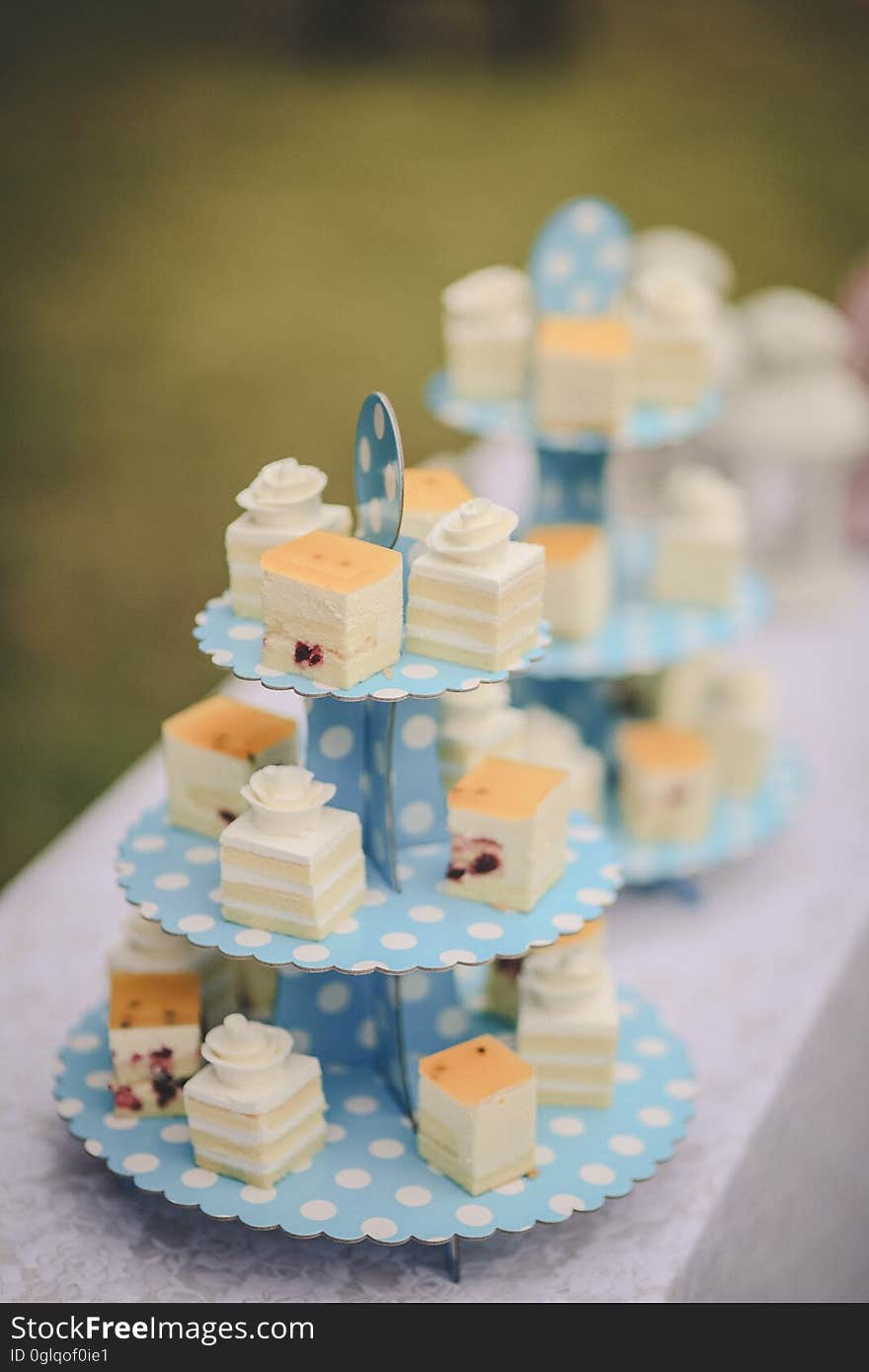 A tray of petit four birthday cake.