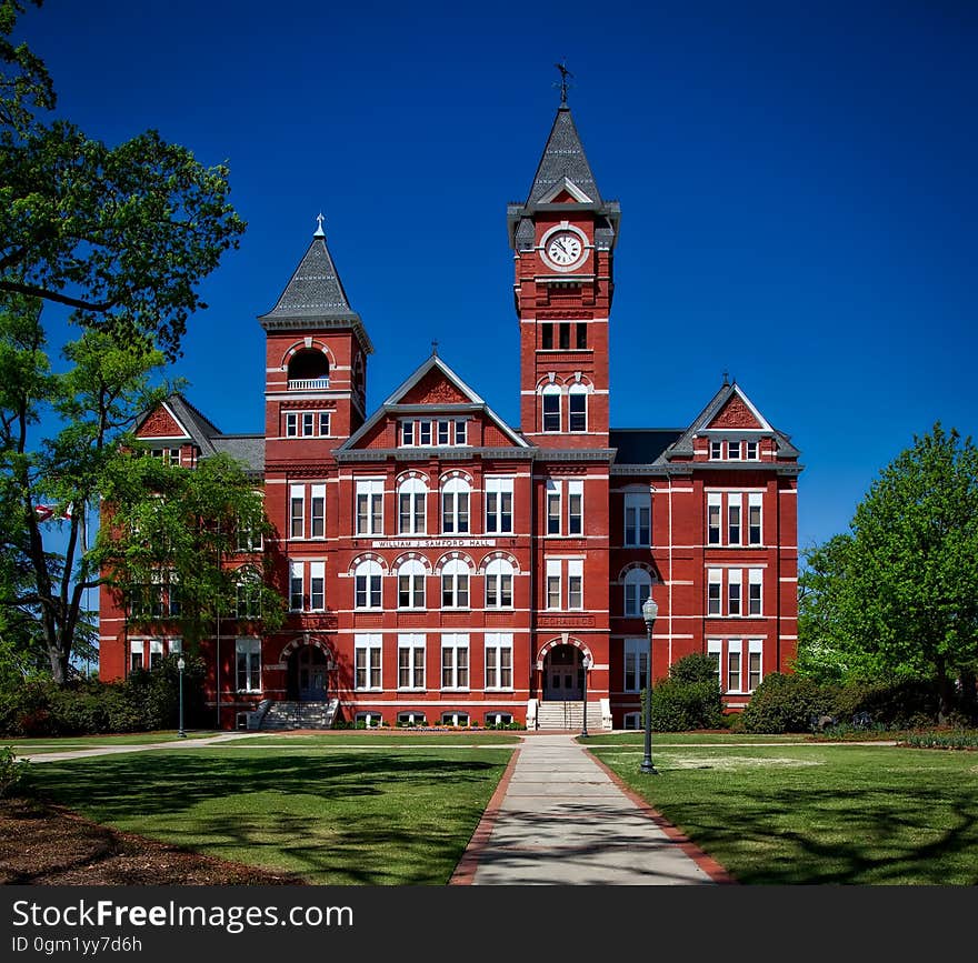 Red Building With Clock Tower