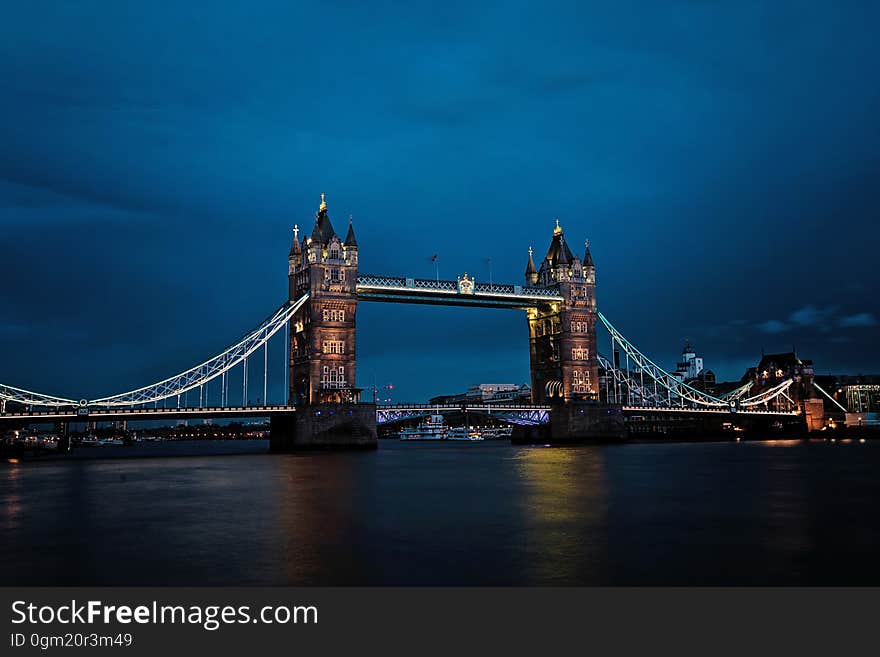 London Bridge reflecting in the River Thames at night. London Bridge reflecting in the River Thames at night.