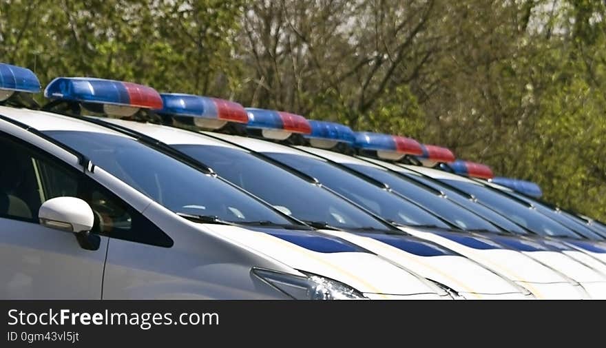 Police cars with sirens red and blue color