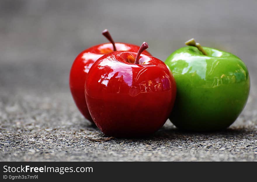 A close up of red and green apples.