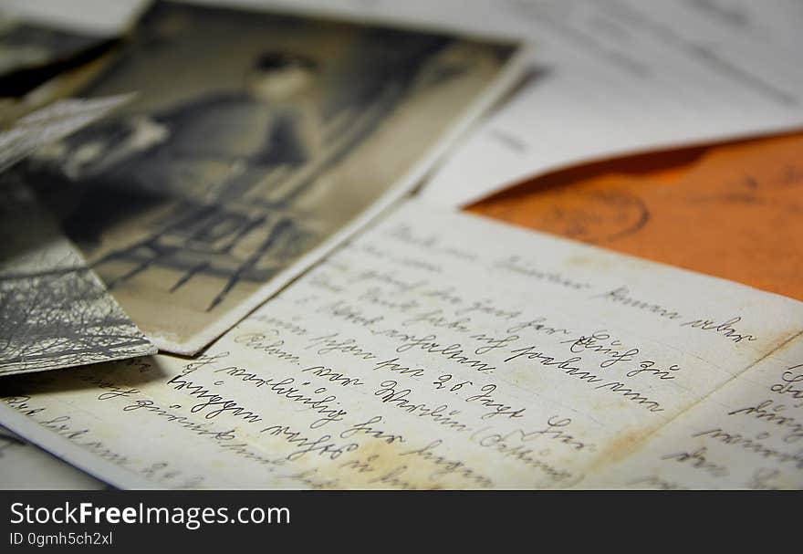 A table with old letters and photos.